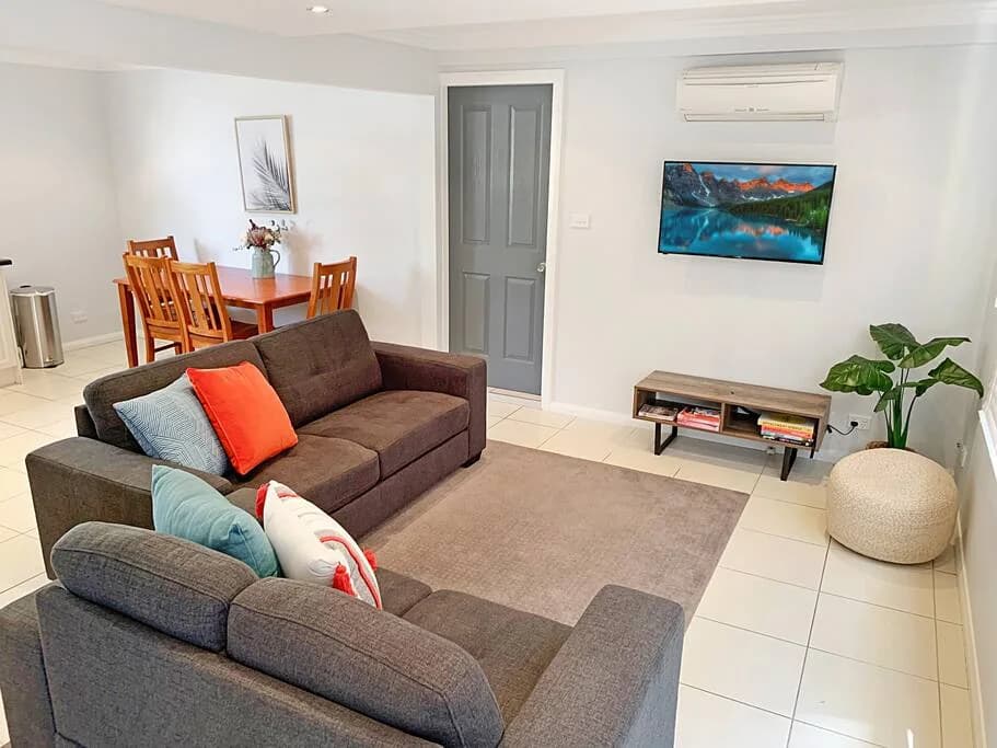Open-plan living and dining area at Brightside Apartment 1